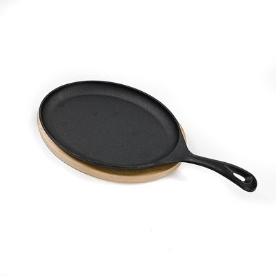 Disco BSCI de Matt Black Cast Iron Sizzle con el Fajita bajo de madera