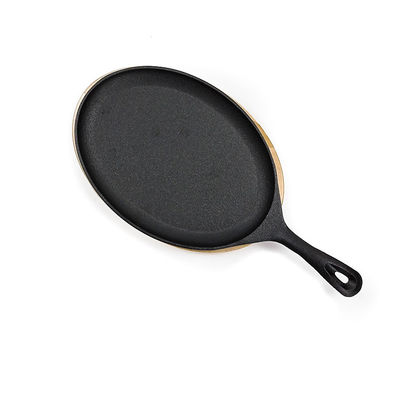 Disco BSCI de Matt Black Cast Iron Sizzle con el Fajita bajo de madera