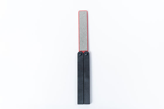 Piedra de afilar echada a un lado doble del cuchillo que dobla a Diamond Sharpener Polish Camping